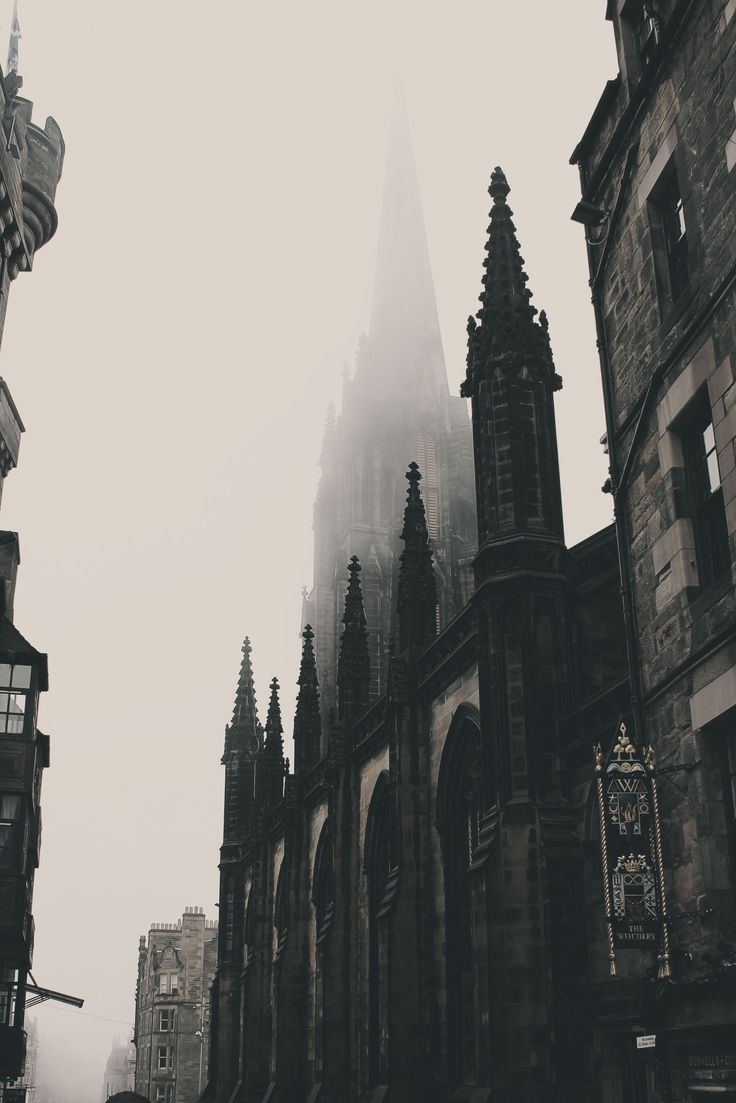 an image of edinburgh scotland with the words edinburgh scotland in red and black on it