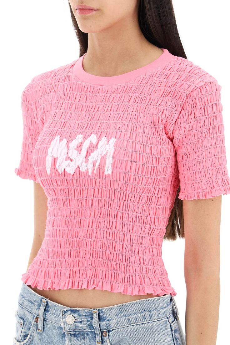 MSGM T-shirt crafted in smocked cotton with contrasting logo print at chest. Ribbed crew-neck design characterized by a waisted fit. The model is 177 cm tall and wears size XS. Size Info STANDARD Color Detail Pink Made In Italy Material 100% CO Season One spring Season Two summer Product clothing Brand MSGM Size And Fit Trench Dress, 1017 Alyx 9sm, Tshirt Crafts, Latest Fashion Design, Pant Shirt, Spring Season, Luxury Retail, Neck Designs, Logo Print