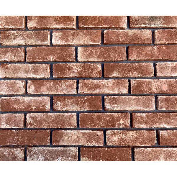 a brick wall that is made out of red bricks and has no mortars on it