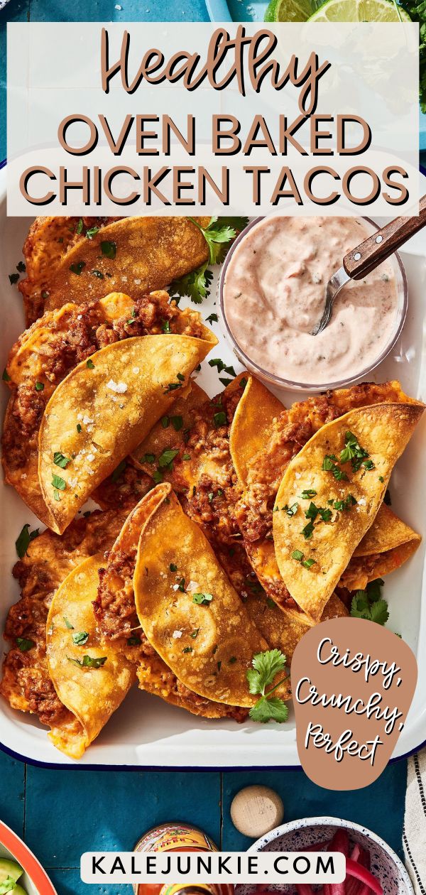 healthy oven baked chicken tacos on a platter with salsa and guacamole