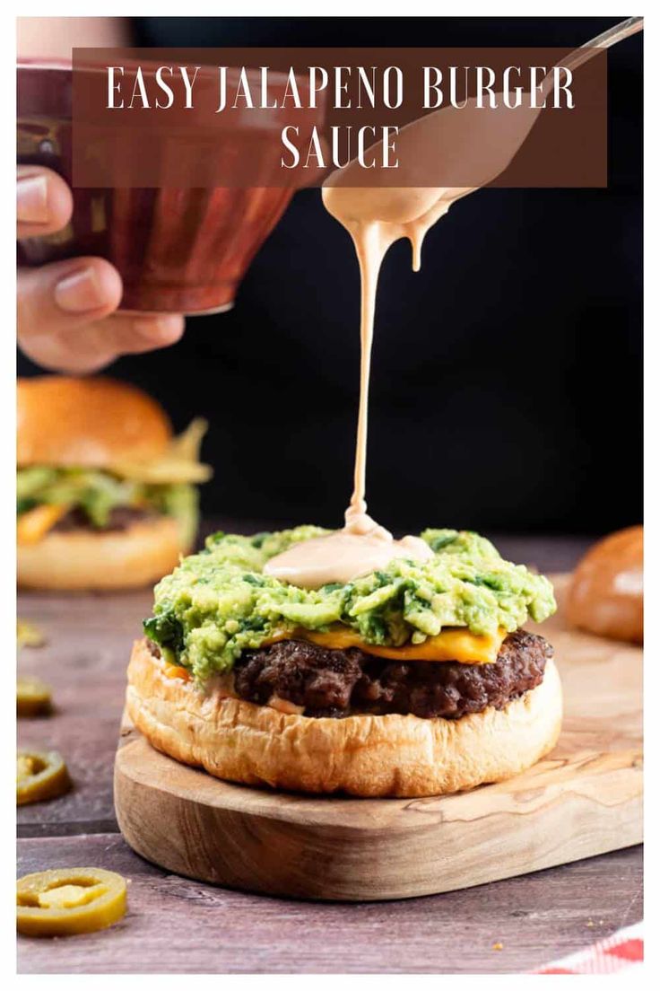 an easy jalapeno burger sauce being drizzled on top of it