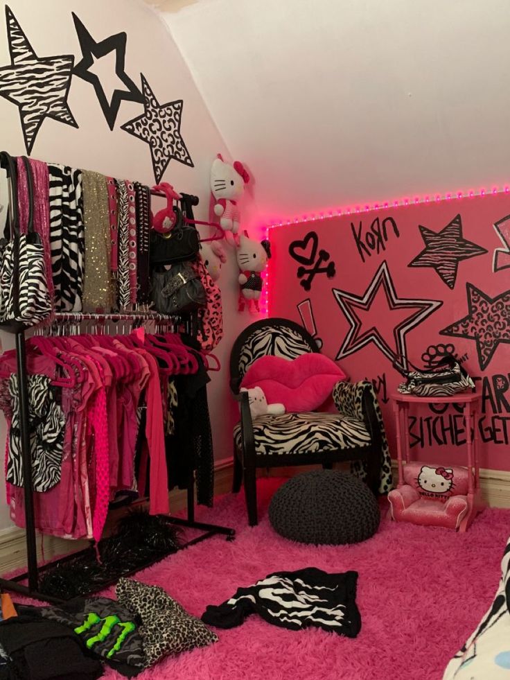 a room filled with zebra print and pink carpeted flooring next to a wall covered in black and white stars