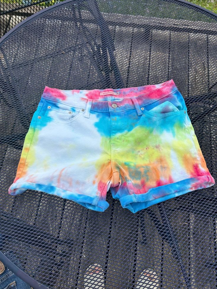 Tie dye Jean shorts Levi brand 32 inch waist Mid length shorts Acid Wash Bottoms With Built-in Shorts, Hand Dyed Acid Wash Bottoms For Summer, Hand Dyed Cotton Bottoms For Summer, Hand Dyed Cotton Summer Bottoms, Tie Dye Cotton Bottoms Short Length, Tie Dye Cotton Short Length Bottoms, Acid Wash Cotton Shorts, Acid Wash Relaxed Fit Shorts For Summer, Summer Acid Wash Relaxed Fit Shorts