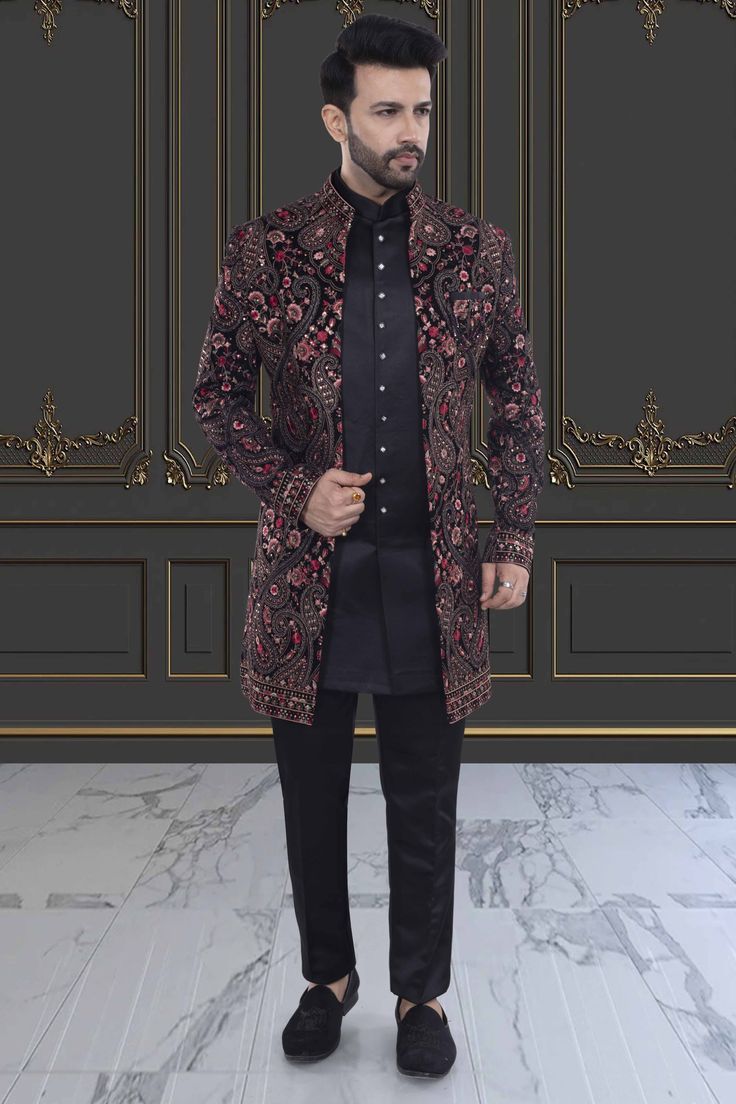 Channel effortless elegance with our Mens Sherwani V2-S48. This black open-jacket sherwani features exquisite thread and sequin embroidery, adding a touch of luxury to your ensemble. Perfect for special occasions, elevate your style with this sophisticated piece. Bollywood Style Formal Outerwear For Eid, Black Outerwear For Wedding During Eid, Luxury Festive Party Sherwani, Black Designer Wear Sherwani For Winter, Festive Black Outerwear With Zari Work, Luxury Black Kurta For Festive Occasions, Black Sherwani For Party With Traditional Drape, Black Bandhgala With Dupatta For Formal Events, Black Bandhgala With Dupatta For Formal Occasions