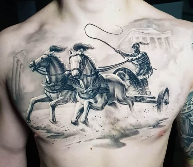 a man with tattoos on his chest riding a horse drawn carriage