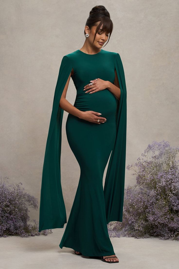 Divine Timing Bottle Green Maternity Maxi Dress With Cape Sleeves – Club L London - USA Green Maternity Dress, Dress With Cape Sleeves, Green Maternity Dresses, Uzun Boy, Dress With Cape, Long Cape, Sleek Bun, Maternity Maxi Dress, Divine Timing