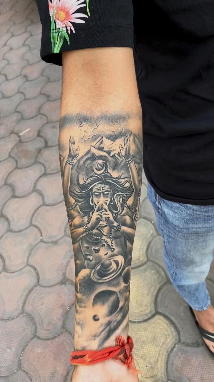 a person with a tattoo on their arm