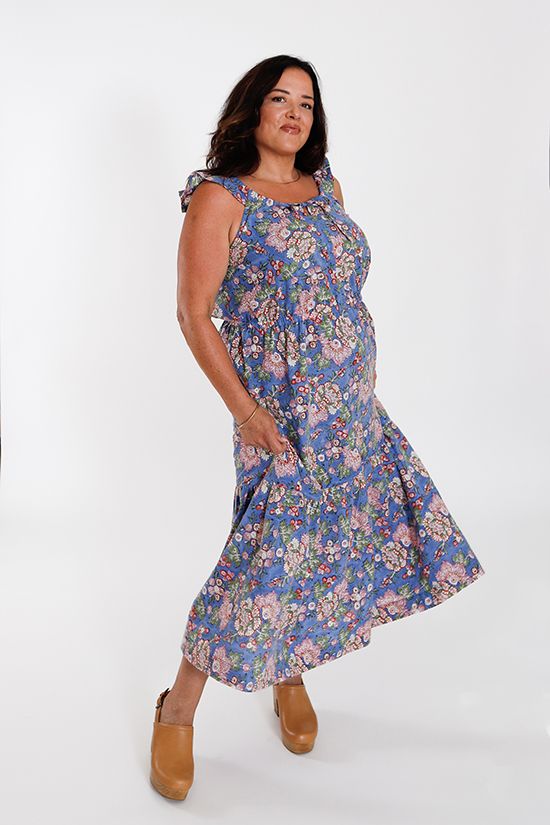 The Ivie is a woven dress or two-piece set in a maxi length. The three sleeve options are a tank ruffle, a cap sleeve and a 3/4 length sleeve. The neckline, sleeve cuff and waistline are adjustable with drawstrings. The waistline is designed to sit high at the natural waist. The top is a cropped length. The skirt includes inseam pockets, a large hem ruffle and a drawstring elastic waist.





Pattern Format: PDF
Size Range: 0-30, with 2 bust cup options
Fabric: WOVEN
Sewing Level: ADVANCED BEGIN Summer Daywear Maxi Dress With Ruffle Hem, Summer Maxi Dress With Ruffle Hem For Daywear, Casual Ruffle Sleeve Maxi Dress For Garden Party, Bohemian Midi Dress With Ruffle Sleeves For Spring, Summer Dress With Ruffle Sleeves For Daywear, Bohemian Maxi Dress With Ruffle Sleeves, Daywear Sundress With Ruffle Sleeves, Summer Floral Print Maxi Dress With Ruffle Sleeves, Casual Ruffle Sleeve Maxi Dress For Summer