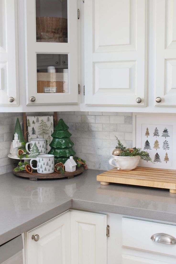 the kitchen counter is clean and ready to be used as a christmas tree centerpiece