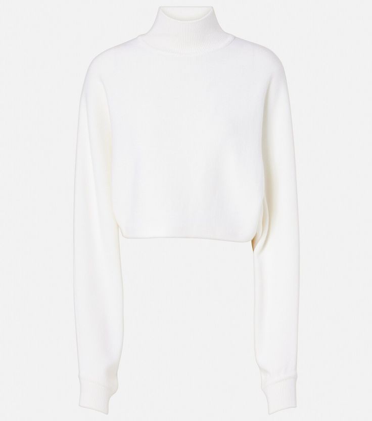 Wool turtleneck sweater in white - Alaia | Mytheresa High Neck Cashmere Sweater, High Neck Polo Sweater For Fall, Wool High Neck Sweater With Ribbed Cuffs, High Neck Sweater With Ribbed Collar, High Neck Merino Wool Sweater With Ribbed Cuffs, Chic Turtleneck With Ribbed High Neck, Cashmere High Neck Turtleneck, Chic Turtleneck With Funnel Neck In Fine Knit, Chic Turtleneck With Fine Knit And Funnel Neck