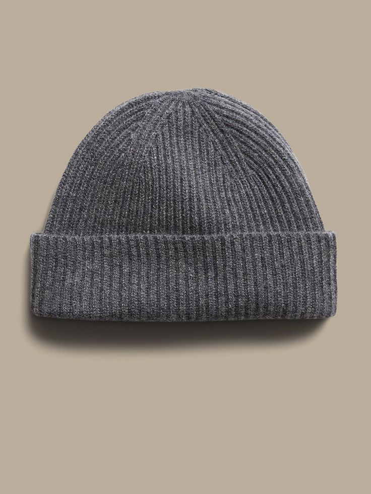 Inspired by fisherman's hats from the turn of the century, this luxuriously soft and warm cashmere beanie is designed in a shorter length so it sits higher up.  Ribbed knit design adds softness and a luxe texture.  Length: 9. 25" (23. 5cm) Classic Solid Beanie For Fall, Classic Soft Knit Hat For Everyday, Classic Solid Color Fall Beanie, Classic Fitted Soft Knit Hat, Classic Warm Beanie For Everyday, Classic Soft Knit Hats For Cold Weather, Warm Classic Beanie For Everyday, Classic Soft Knit Beanie, Classic Knitted Beanie For Everyday