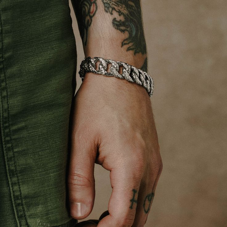 This substantial chainlink bracelet features a heavy-duty hammered texture that's just as rough around the edges as you are. Water Bracelet, Everyday Bracelet, Light Well, Mens Bracelet Silver, Men's Bracelet, Neck Chain, Sterling Silver Mens, Silver Pieces, Chain Link