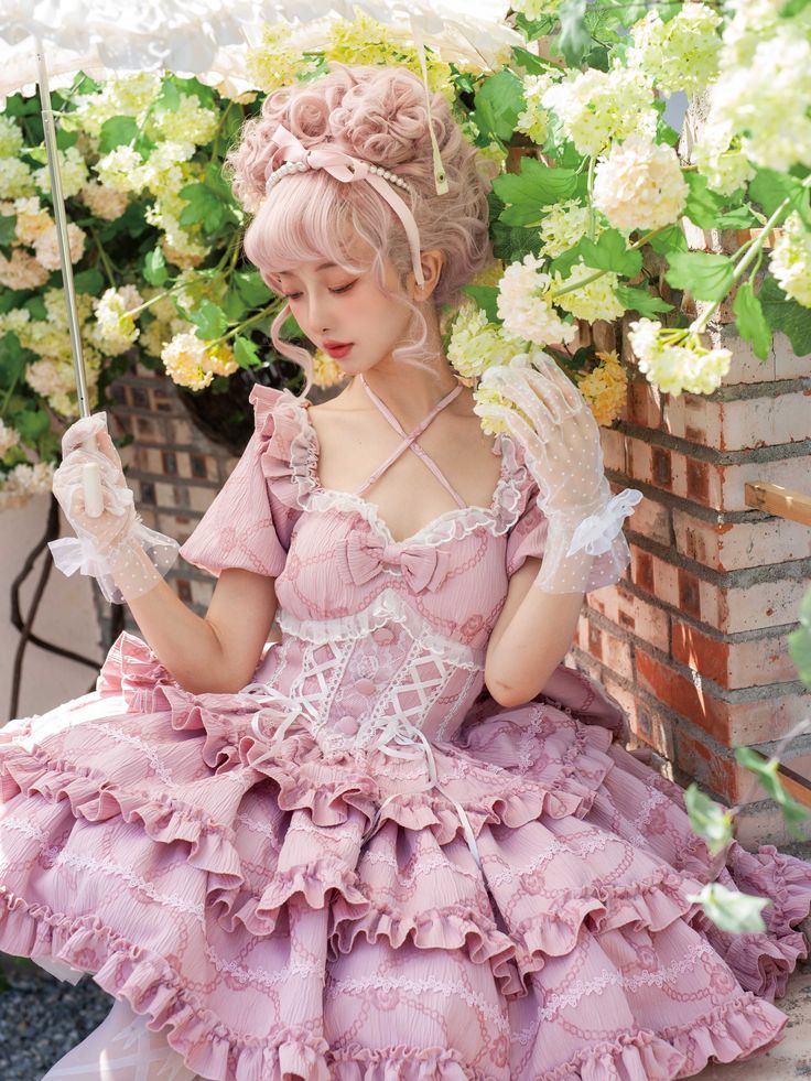 Step into a fairytale with our Princess Corset Waist Dress. This enchanting Lolita OP (One Piece) features a whimsical ruffle skirt that cascades beautifully, creating a dreamlike silhouette. The corset waist not only cinches to accentuate your figure but also adds an air of regal elegance. The pièce de résistance is the oversized bow at the back, a delightful touch that makes every exit as memorable as your entrance. Perfect for tea parties, cosplay, or any occasion where you want to feel like Princesscore Ruffle Dress For Costume Party, Fitted Princess Fairy Dress With Ruffles, Fairycore Fairy Dress With Ruffles For Party, Ruffled Fairy Dress For Party In Princesscore Style, Fairytale Party Dress With Ruffles, Fitted Princess Dress With Ruffled Skirt, Princesscore Fairy Dress With Ruffles For Party, Spring Princess Dress With Ruffled Skirt, Fairytale Ruffles Fairy Dress For Fancy Dress