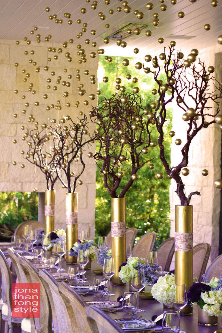 a long table with purple and gold decorations