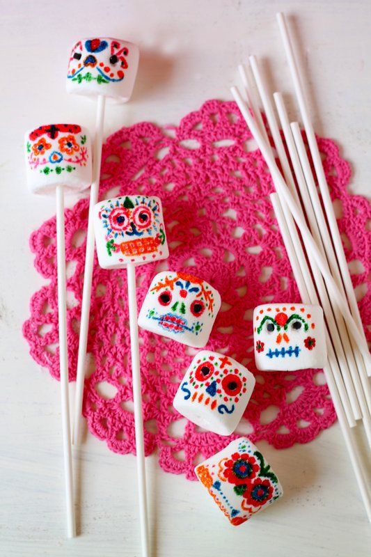 sugar skulls on sticks with crocheted doily