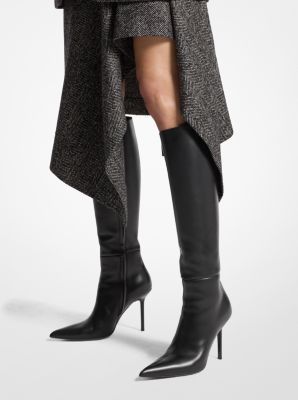 Equally sleek and sophisticated, our new Angelina boots first graced the runway with statement-making appeal for Fall/Winter 2024. Made in Italy from supple leather, this pointed-toe pair is designed in a knee-high silhouette and set on a striking tapered stiletto heel. Emulate the runway look with the season’s favorite knit turtleneck dress. Knit Turtleneck Dress, Turtleneck Dress, Knit Turtleneck, Michael Kors Collection, Fall Winter 2024, Leather Boot, Turtle Neck Dress, Winter 2024, Heel Type