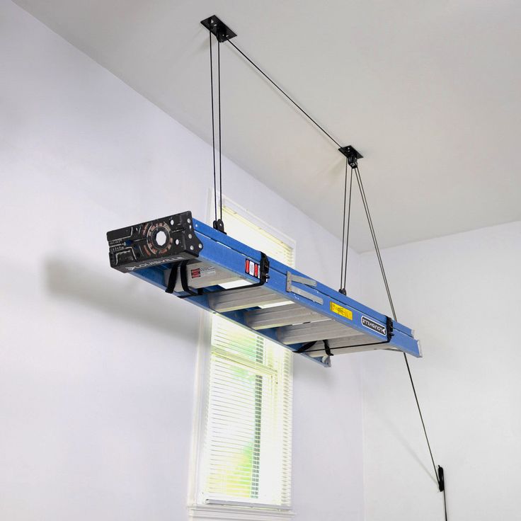 ladder ceiling pulley Ladder Storage Garage, Garage Storage Pulley, Ladder Storage Ideas, Ladder Ceiling, Garage Hoist, Overhead Storage Rack, Garage Ceiling Storage, Hanging Ladder, Mechanical Advantage