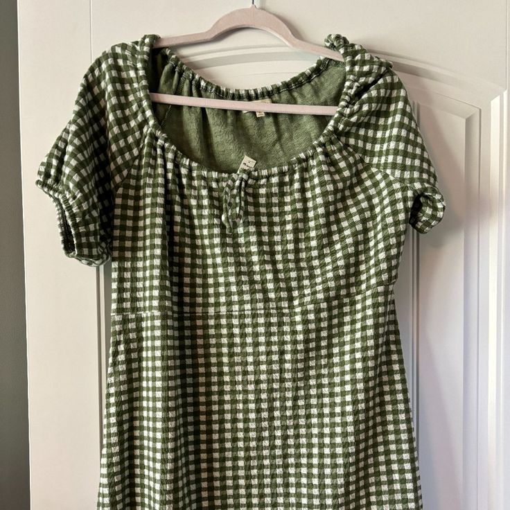 This Is Such A Cutie Dress! Little Olive And White Gingham Puff Sleeve Dress With A Cute Little Tie! It's Almost A Milkmaid Silhouette! Nice And Stretchy Too! Non-Smoking, Dog-Friendly Home Chic Short Sleeve Gingham Mini Dress, Gingham Plaid Mini Dress, Retro Short Sleeve Plaid Gingham Dress, Playful Short Sleeve Gingham Dress, Fitted Gingham Mini Dress With V-neck, Madewell Dresses, Puffed Sleeves Dress, Dog Friends, Madewell