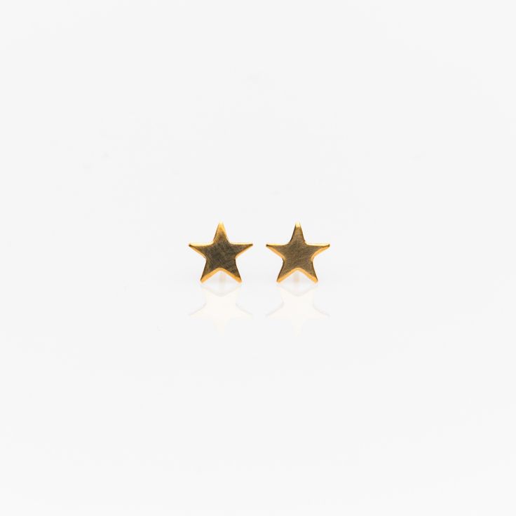 Small, simple, and beautiful, these stunning studs are sure to be a new favorite. Materials: 14k Gold Fill, Sterling Silver Measurements: .25" x .25" Gold Minimalist Studs For Gift, Minimalist Yellow Gold Star Earrings, Everyday 14k Gold Star Earrings, Classic Studs For Gift, Star Earrings Stud, Silver Moon, Star Studs, Sterling Silver Cross, Silver Cross