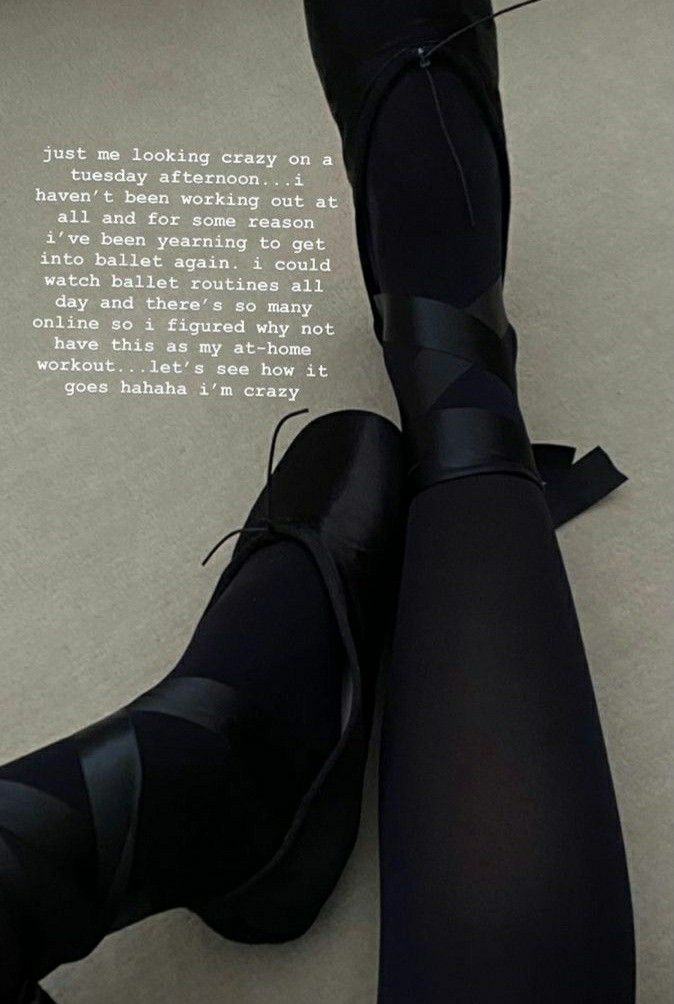 the legs and ankles of a woman in black tights, with text written on them