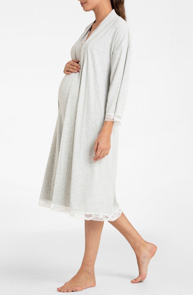 Feel the luxury of this bump-cradling robe designed with a tie belt and lacy trim. V-neck Long sleeves Removable tie belt 47% viscose, 45% cotton, 8% elastane Machine wash, line dry Imported Elegant Sleepwear With Tie Waist, Elegant Lace Trim Robe For Spring, Elegant Dresses With Tie Waist For Loungewear, Spring Robe With Lace Trim For Loungewear, Elegant Spring Robe For Bedtime, Elegant Spring Robe With Lace Trim, Feminine Robe With Lace Trim For Loungewear, Fitted Robe With Lace Trim For Daywear, Fitted Lace Robe For Loungewear