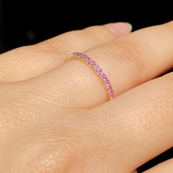 "Real Pink Sapphire Band, Micro Pave Pink Sapphire Wedding Band, 14K Yellow Gold Stacking Sapphire Ring, Round Cut Light Pink Sapphire Band Natural Natural Pink Sapphire Band featuring round brilliant diamond cut light pink sapphires on Solid 14K White, Yellow or rose gold. This band features a stunning U Prong micro pave setting for a minimalist final look. The sapphires are a light pink diamond cut which gives them that lovely sparkle under the sun. The stones measure 1.35 mm each and have a t Wedding Rings With Pave Setting And Pink Sapphire, Wedding Ring With Pink Sapphire And Pave Setting, Pink Sapphire Pave Wedding Jewelry, Wedding Rings With Diamond Cut Pink Sapphire, Pink Sapphire Wedding Rings With Pave Setting, Pink Gold Jewelry For Wedding With Round Cut, Pink Gold Wedding Jewelry With Round Cut, Rose Gold Pink Sapphire Jewelry For Wedding, Rose Gold Pink Sapphire Wedding Jewelry