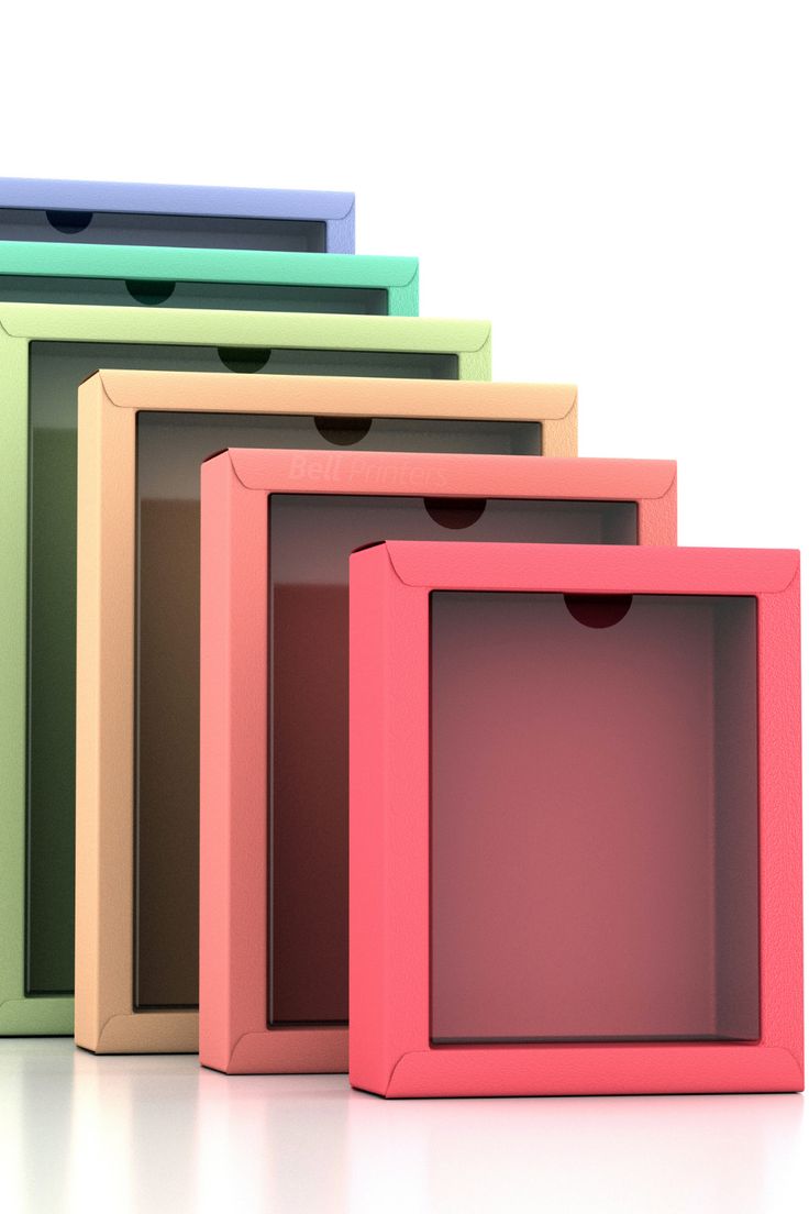 four different colored boxes with handles on each side and one in the middle, all lined up