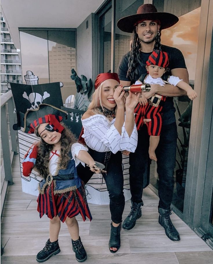 34 Best Family Costume Ideas That Everyone Will Love 102 34 Best Family Costume Ideas That Everyone Will Love Family Pirate Costumes Ideas, Family Costume Ideas, Disney Cruise Family, Coordinated Outfits, Pirate Halloween Costumes, Trio Halloween Costumes, Pirate Halloween, Cruise Outfits, Family Cruise