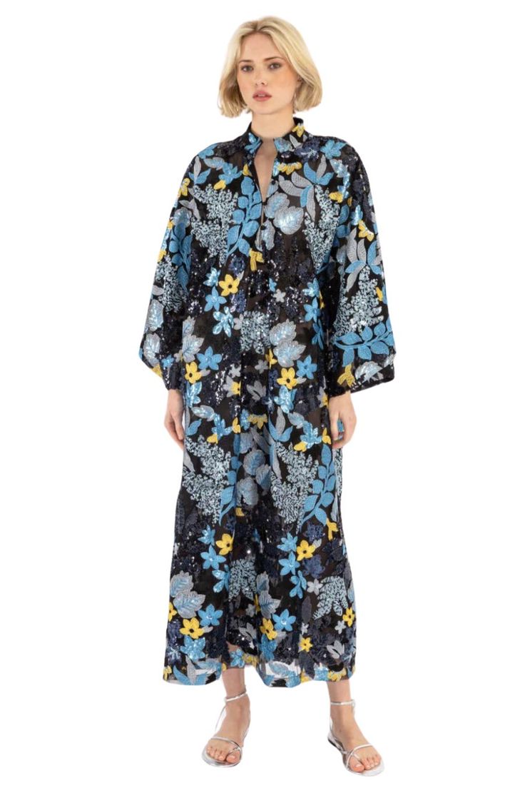 Slip on our signature caftan silhouette for an effortless look that feels refined. this caftan features sequin embroidered florals in blue hues, with golden florals peeping throughout. handmade. banded collar. bell sleeves. bust: 50", hem opening: 69", sleeve opening: 38", body length: 51" four button placket. dry clean. see-through. pictured with undergarments. sales promotions not applicable to outside partners. Model is 5'9" / 175cm. this item is only available in one size. Floral Print Long Sleeve Kaftan For Daywear, Blue Long Sleeve Kaftan With Floral Print, Long Sleeve Floral Print Patterned Kaftan, Festive Floor-length Floral Print Kaftan, Blue Floral Print Long Sleeve Kaftan, Spring Floral Print V-neck Kaftan, Bohemian Floral Print Floor-length Kaftan, Hemant And Nandita, Rebecca Vallance