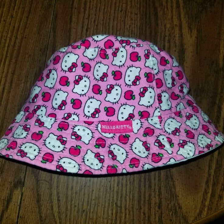 Adotable Hello Kitty Little Girls Bucket Hat / Sun Hat. Adorned With Hello Kitty And Apples Pattern. Hat Measures Approximately 19 Inches Around (Circumference) And Approximately 6 Inches From Top To Brim Of Hat. 100% Cotton And Machine Washable. Nwot. Cute Spring Hats, Cute Cotton Brimmed Sun Hat, Cute Brimmed Cotton Sun Hat, Cute Fitted Cotton Hats, Cute Adjustable Cotton Sun Hat, Cute Bucket Hat With Curved Brim, Pink Hat One Size Fits Most For Playtime, Cute Cap Style Sun Hat For Playtime, Cute Multicolor Cotton Hats