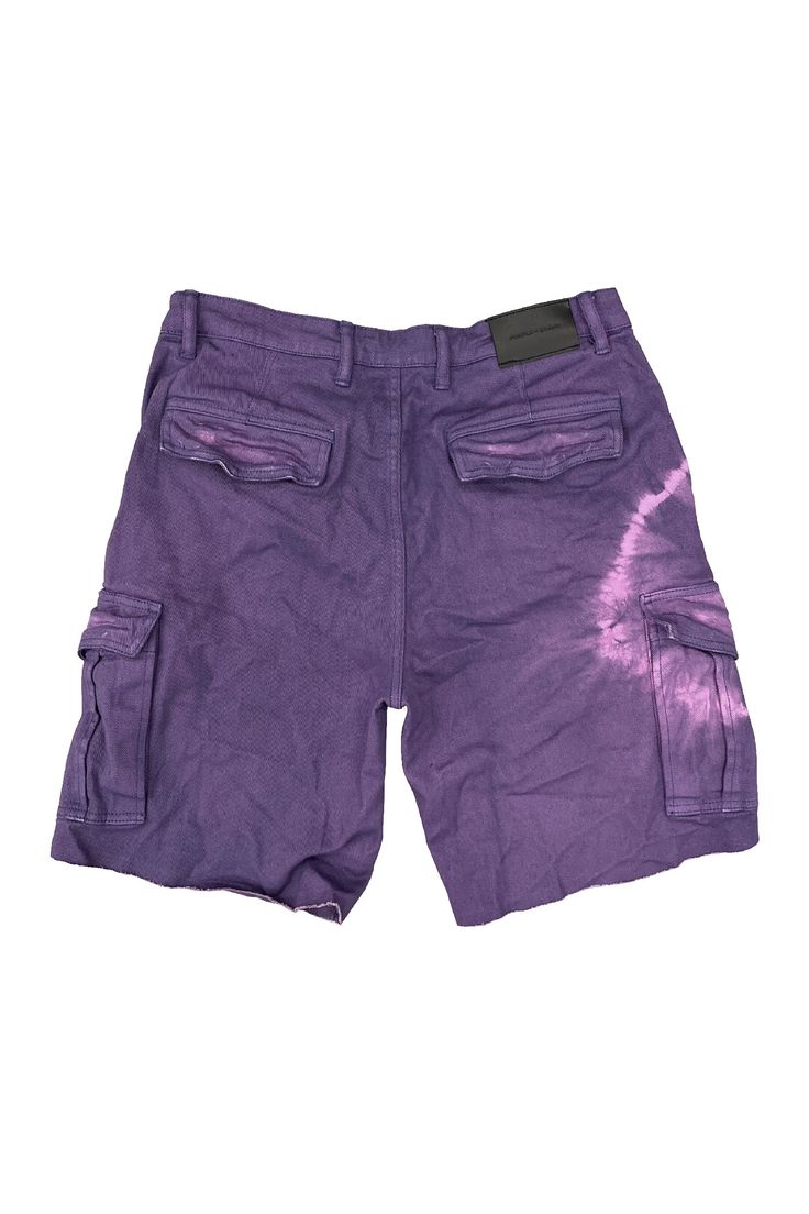 Style No. P516-TCGB223 Color: Purple This lightweight short is designed with circular bleach detailing on the right leg. This style is constructed from a soft twill and features light fraying at the hem, two large cargo pockets at the sides, a button closure and reinforced belt loops. 100% Cotton. Lined back pockets and yoke. Reinforced belt loops. Cargo Pockets. Purple Brand P516 Twill Grape Cargo Short. Cotton Bermuda Cargo Shorts For Streetwear, Bermuda Cotton Cargo Shorts For Streetwear, Cotton Washed Short Bottoms, Washed Cotton Shorts, Casual Purple Bottoms With Cargo Pockets, Acid Wash Cotton Bottoms With Cargo Pockets, Streetwear Cotton Cargo Shorts With Patch Pockets, Urban Cotton Shorts With Cargo Pockets, Cotton Cargo Shorts With Patch Pockets For Streetwear