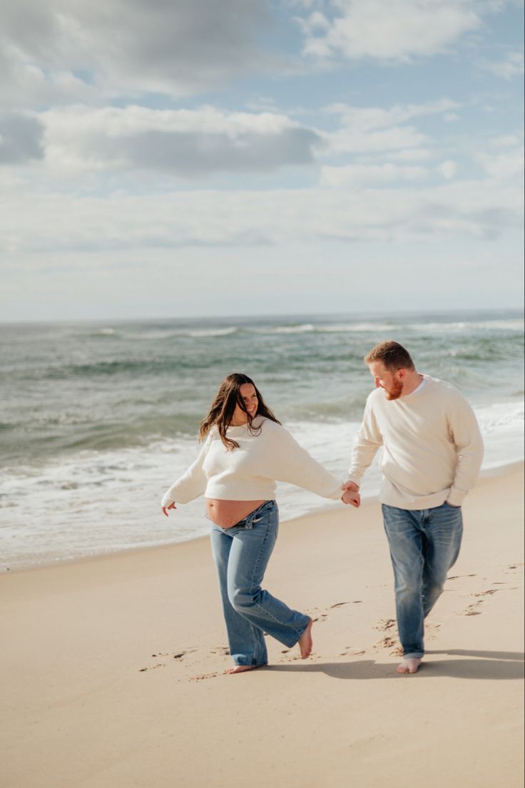 Maternity photo on the beach with jeans and white top Winter Beach Maternity Photos, Morning On The Beach, White Crop Sweater, Beach Maternity Photos, Maternity Picture, Winter Beach, Spring Morning, Long Beach Island, Winter Maternity