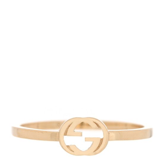 This is an authentic GUCCI 18K Yellow Gold Interlocking G Ring size 50 or 5.5.The ring is crafted of 18 karat yellow gold and features the Gucci GG logo. Gold Gucci Ring, Luxury 14k Gold-tone Rings, Designer Polished Gold Rings, Designer Gold Ring With Polished Finish, Designer Gold Rings With Polished Finish, Luxury Gold-plated Jewelry With Gold-tone Logo, Designer Gucci Rings With Polished Finish, Gucci Fine Jewelry Rings For Formal Occasions, Gucci Formal Fine Jewelry Rings