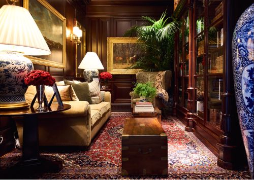 the living room is decorated in blue and white