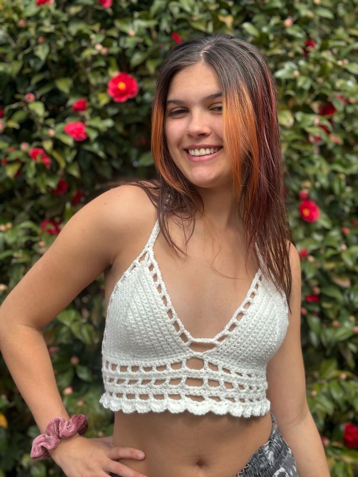 Jump into summer with this beautifully designed crochet top! The shell border can't wait to be shown off at the beach, mall, or wherever your adventures take you! Tying at the neck and behind the back ensures a secure fit for your day out. (The picture is a size S, B cup.) Crochet Lace V-neck Crop Top For Summer, Summer V-neck Beach Crop Top, Summer Festival Crochet Top With Lace Trim, Lace Trim Crochet Top For Beach, Spring Beach Tank Top With Crochet Trim, Casual Crochet Top With Crochet Trim For Beach, Sleeveless Beachy Crochet Top For Beach Party, Beachwear Tops With Crochet Trim For Beach Cover-up, Fitted Casual Crochet Top For Beach