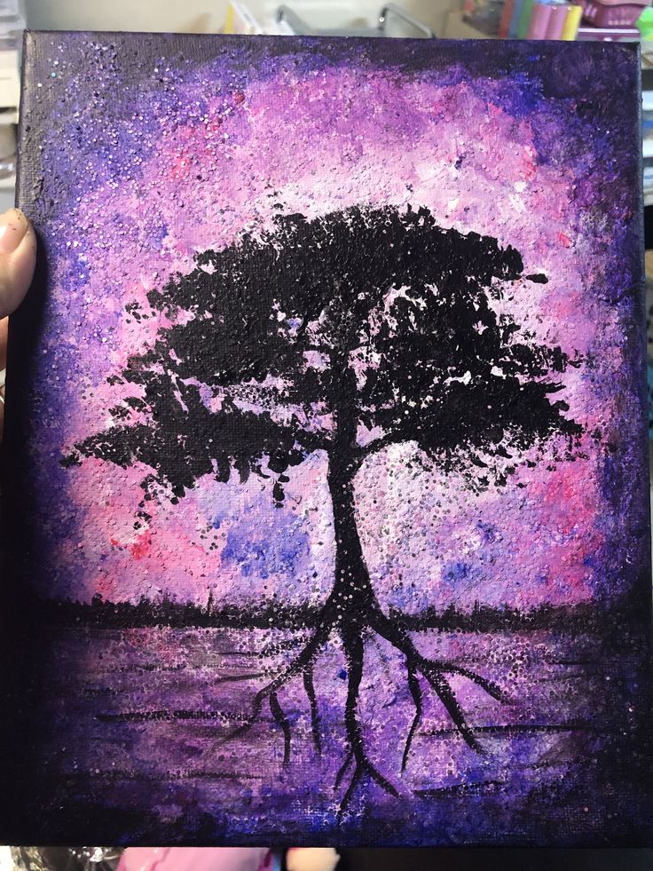 a painting of a tree with purple and blue colors is shown in the foreground