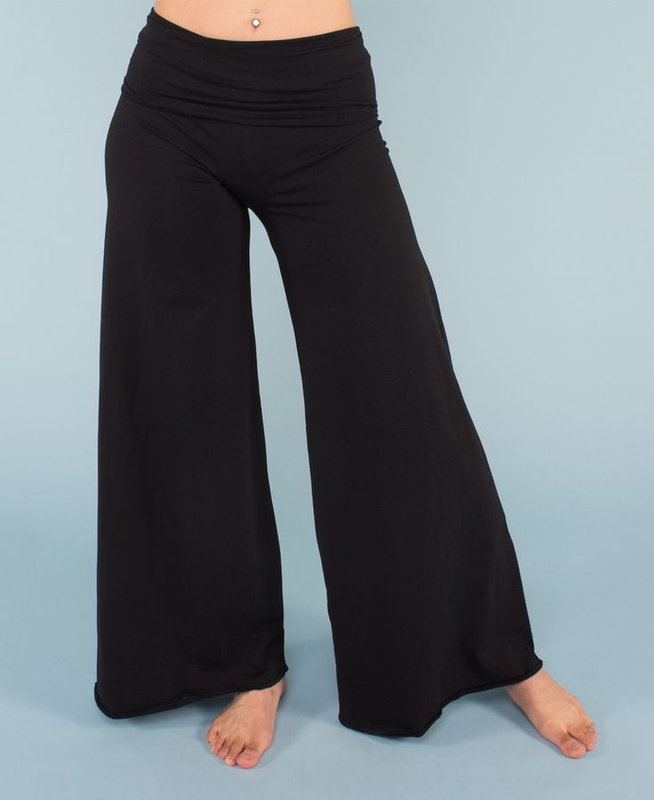 Life is easier when you go with the flow... With a comfortable, extra long roll-top waist, and made of soft organic cotton fabric, you'll naturally relax each time you wear these amazing flowy pants. Our flowy pants feature an overlock decorative stitch on the bottom edge   (versus a traditional rolled-hem). This lightweight seam creates a slight roll of the fabric at the bottom. Relax and just go with the flow in these boho palazzo pants! Black, Cabernet, Dark Teal. Womens Flowy Dresses, Just Go With The Flow, Pants Boho, Teacher Clothes, Wrap Mini Skirt, Go With The Flow, Flowy Pants, Roll Top, Organic Clothing