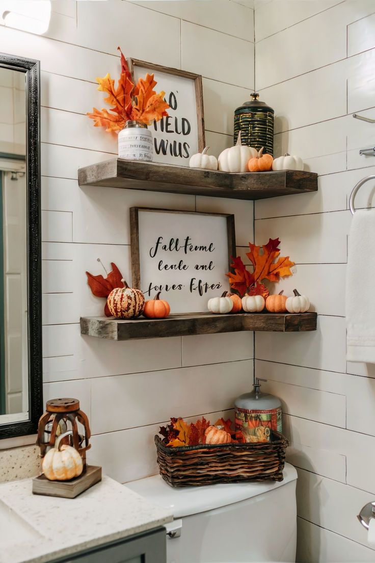 Fall-themed bathroom shelf with mini pumpkins and autumn leaves Fall Bathroom Decor Ideas, Fall Apartment Decor, Fall Bathroom Decor, Bathroom Counter Decor, Fall Bathroom, Fall Room Decor, Halloween Bathroom, Cozy Fall Decor, Fall Decor Inspiration