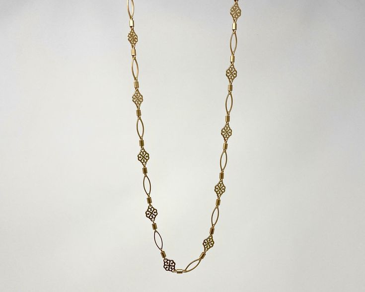 Long Gold Chain Necklace - One of our Best Sellers! Lightweight and Perfect for every day. This 36" necklace with lobster clasp is sure to be a go-to whether you layer up or wear it solo. Matte Gold Plated over brass for a warm golden finish that has a subtle glow. Looks great layered with our Double Lariat Spike Necklace Resists Tarnishing Handcrafted in Florida Due to the handcrafted nature of our product, all items will vary slightly Spike Necklace, Long Chain Necklace, Long Chain, Gold Chain Necklace, Gold Plated Chains, Matte Gold, Gold Chains, Chains Necklace, Gold Jewelry