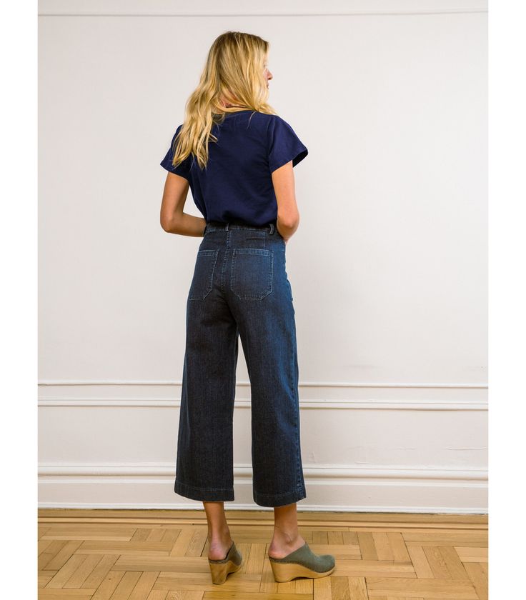 The Simone Jeans are our classic best-selling "perfect butt" high waisted jeans. Made from stretchy Indigo denim and featuring 1970's inspired front and back pockets, hidden button fly and wed cropped length, these are sure to be your new favorites! FIT NOTE: The measurements below are of the actual pants. These are made with stretch fabric and will fit up to 2" bigger if needed as they will stretch to fit your body. If you want a tight snug fit, we suggest buying these in the smallest size that Chic Rigid Denim Bottoms With Pockets, Recycled Denim Jeans With Belt Loops For Work, Chic High Waist Rigid Denim Bottoms, Chic High-waist Rigid Denim Bottoms, Cotton Cropped Jeans For Work, Workwear Cropped Cotton Jeans, Cropped Jeans Cotton Workwear Standard Cut, High Waist Flare Jeans In Recycled Denim, Rigid Denim Cropped Bottoms For Work