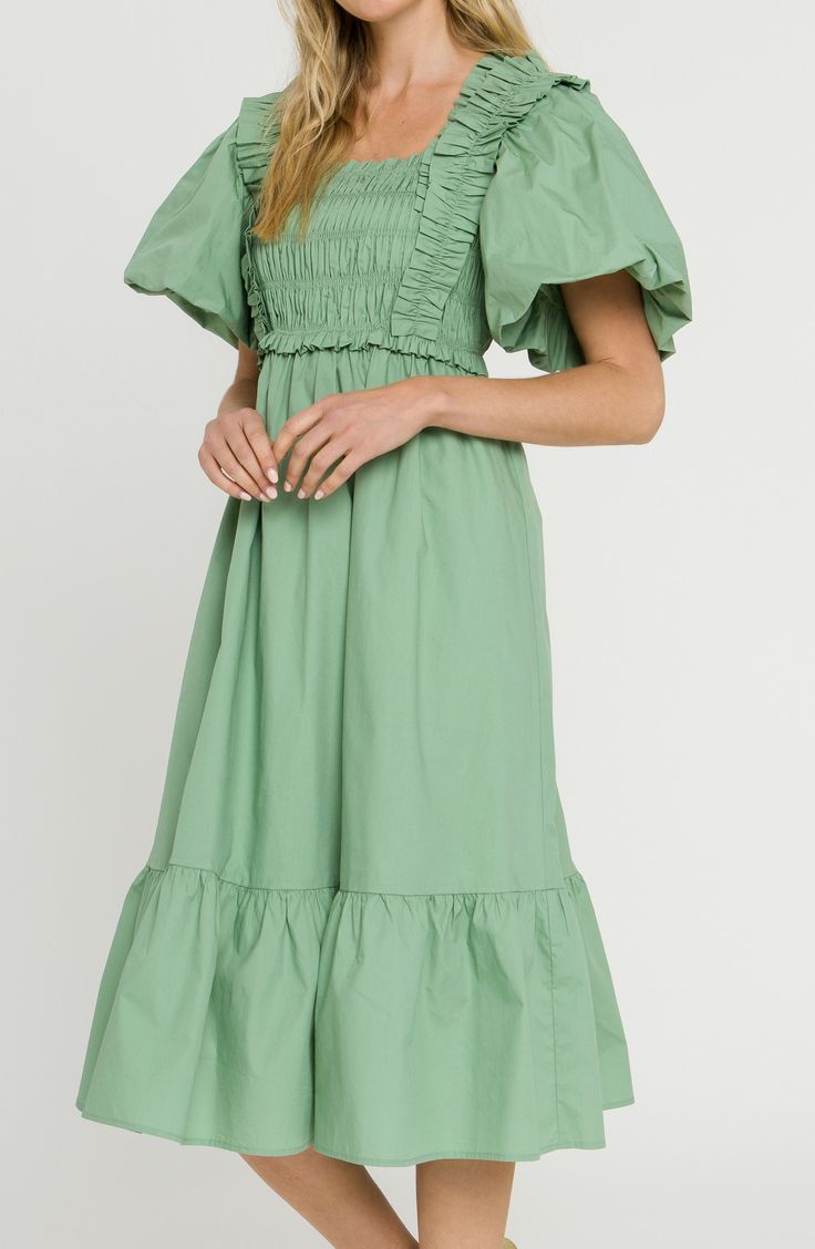 Pure prairie style enthusiastically informs this cotton dress decked with outsize charm from the oversized sleeves to the joyful ruffle at the hem. Square neck Short sleeves with elastic cuffs Lined 100% cotton Hand wash, dry flat Imported Women's Clothing Spring Midi Dress With Smocked Bodice And Ruffle Sleeves, Cotton Midi Dress With Ruffle Sleeves, Cotton Puff Sleeve Dress With Elastic Sleeves For Spring, Spring Puff Sleeve Peasant Dress For Brunch, Spring Cotton Puff Sleeve Dress With Elastic Sleeves, Spring Peasant Dress With Puff Sleeves For Brunch, Spring Smocked Dress With Ruffle Hem And Sleeves, Spring Brunch Peasant Dress With Puff Sleeves, Casual Puff Sleeve Dress With Bishop Sleeves For Spring