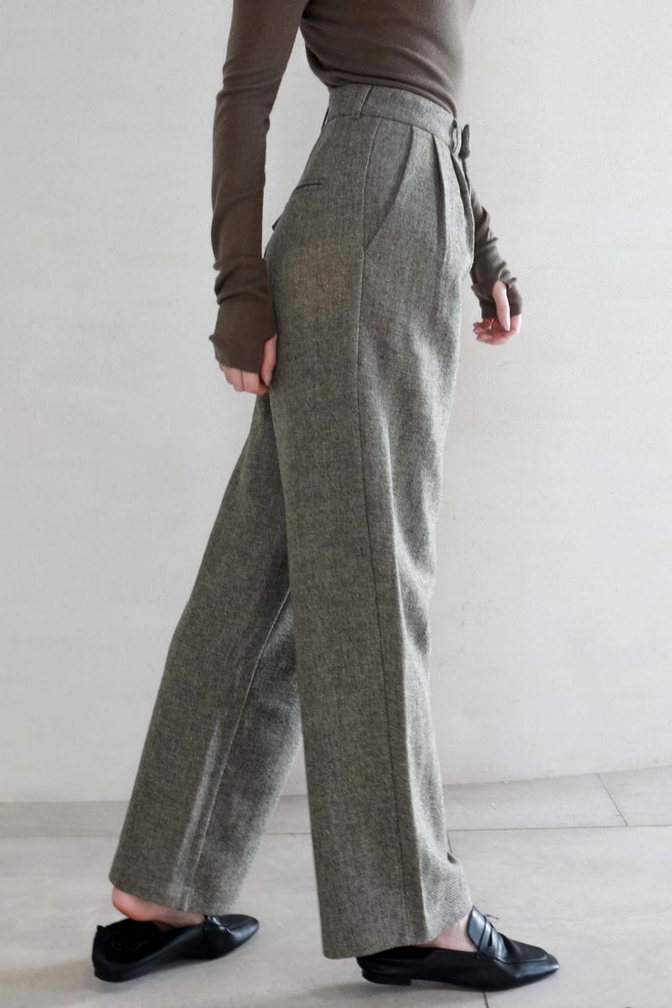 Made with 100% wool, these wide leg pants are a must-have for winter. They drape beautifully. and is soft to the touch. These wool pants features a zipper and button closure. Style #: WWAH909 Grey Wool Wide Leg Pants, Formal Wool Wide Leg Pants For Spring, Elegant Wool Wide Leg Pants For Spring, Elegant Wide Leg Wool Pants For Spring, Classic Straight Leg Winter Bottoms, Tailored Solid Winter Bottoms, Tailored Solid Color Winter Bottoms, Tailored Winter Bottoms With Pockets, Tailored Bottoms With Pockets For Winter