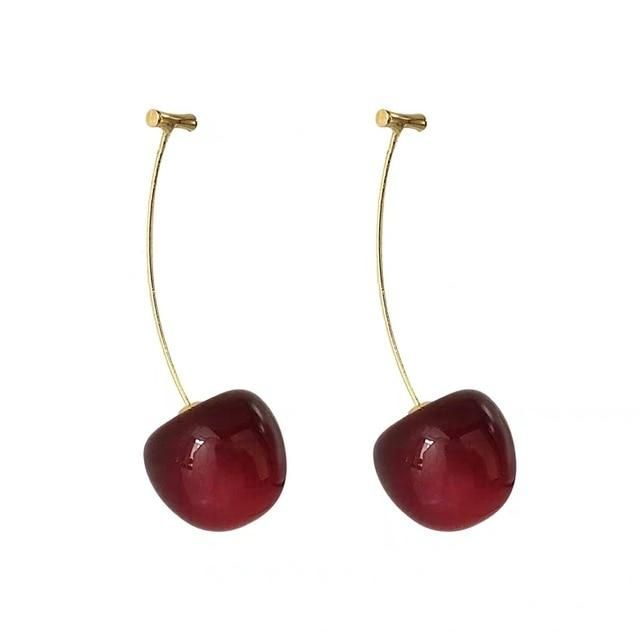 These luscious cherry earrings are alluring and fascinating just like you.🍒NOW GOLD PLATED!!!🍒 Material: Zinc Alloy, 16K Gold Plated, ResinSize: 6cm by 2cmWeight: 14g per PairDesign: Cherry Fruit On a Stem Drop Statement EarringsColor: Dark Red, Yellow Gold Lesbian Earrings, Travel Inspired Jewelry, Cherry Drop Earrings, Weird Jewelry, Random Style, Cherry Fruit, Fruit Jewelry, Cherry Earrings, Fancy Gifts