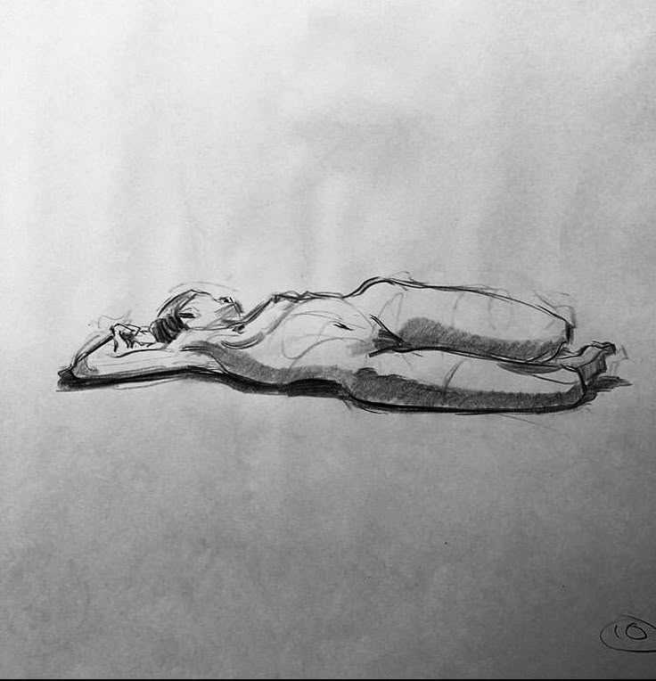 a drawing of a person laying on the ground