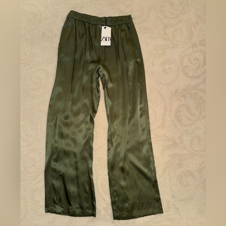 These Zara Satin Pants Are Super Comfortable. Elastic Waistband With 2 Side Pockets. Brand New In A Beautiful Olive Green Color. Charcoal Grey Dress, Zara Trousers, Cream Trousers, Side Pants, Cream Pants, Satin Trousers, Satin Pants, Grey Dress Pants, Flowy Pants