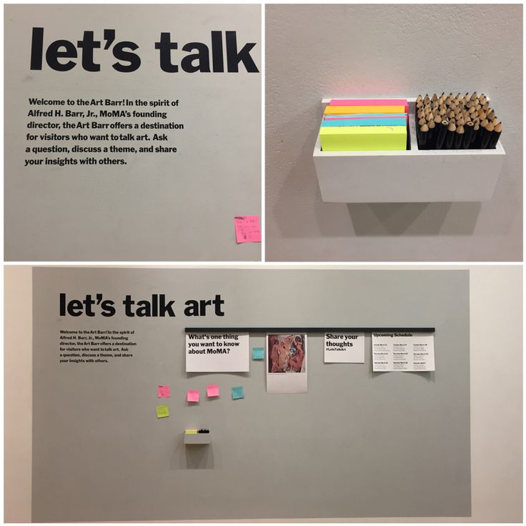 there is a display with sticky notes and post it notes on the wall next to each other