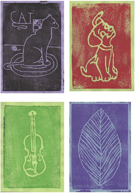 four different colored cards with an image of a dog, cat and violin on them