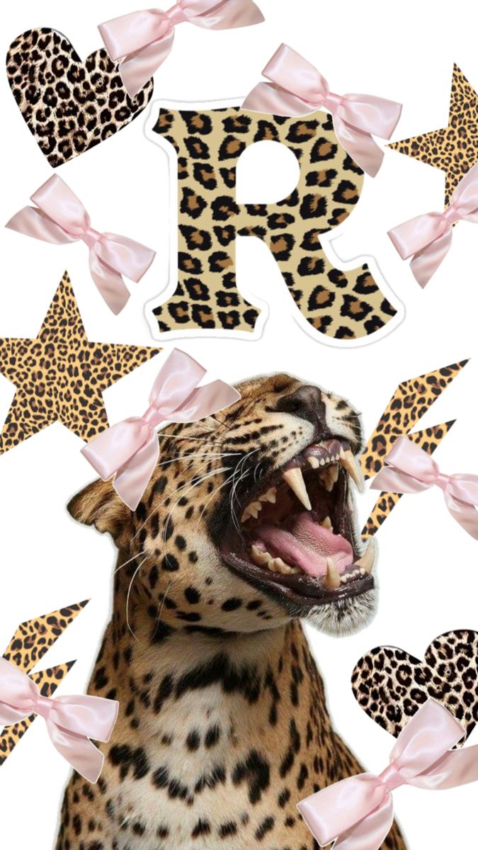 a leopard with its mouth open and some pink bows around it