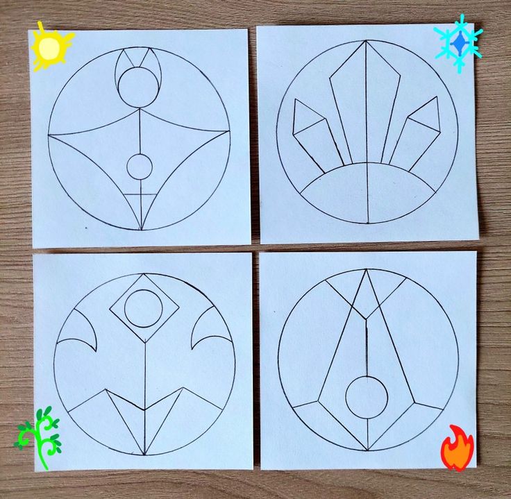 four pieces of paper cut out to look like art work with circles and shapes on them