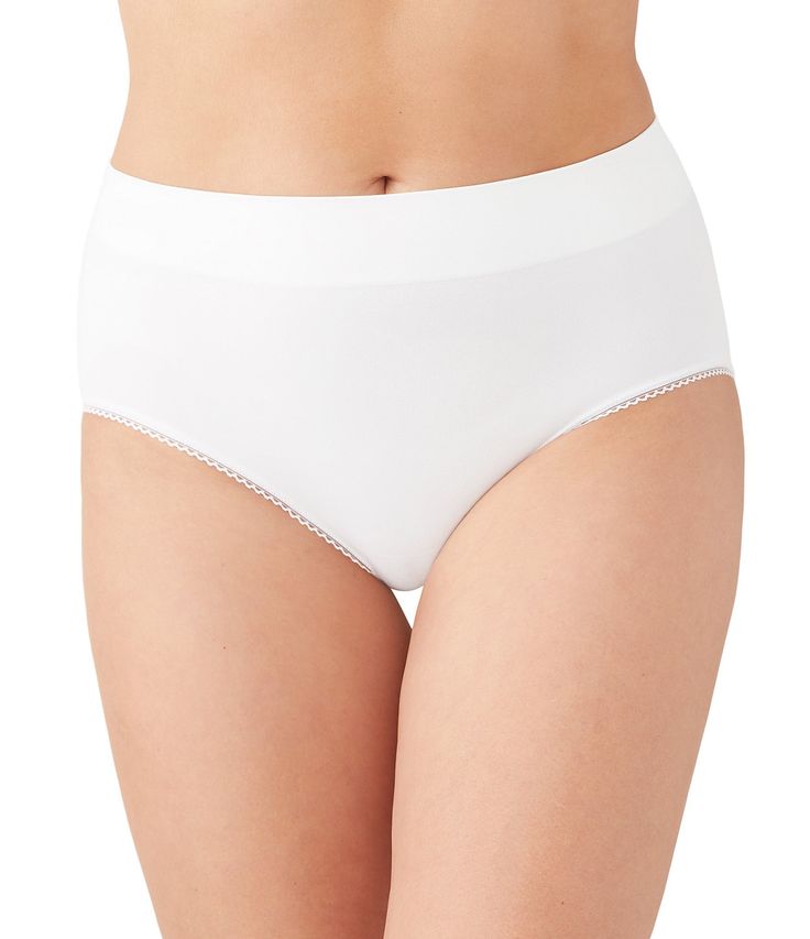 From Wacoal, this panty features:Seamless briefSmooth, supportive nylon/spandex fabricTotally seamless bodyRuching knitted in derrièreClothes glide easily over panty for a sleek lookBody: nylon/spandexCrotch lining: nylon/cotton/spandexHand wash/line dryImported.Endlessly comfortable & simple to wear, these lightweight stretch panties with a no-pinch waistband feel incredible against your skin & vanish Elegant Stretch Seamless Hosiery, Elegant Seamless Stretch Hosiery, Elegant Supportive Solid Bottoms, Elegant Supportive Solid Color Bottoms, Elegant Seamless Solid Hosiery, White Stretch Shapewear Bottoms, White Seamless High-cut Leg Shapewear, White Seamless Shapewear Bottoms, Shaping Seamless Design Shapewear Bottoms